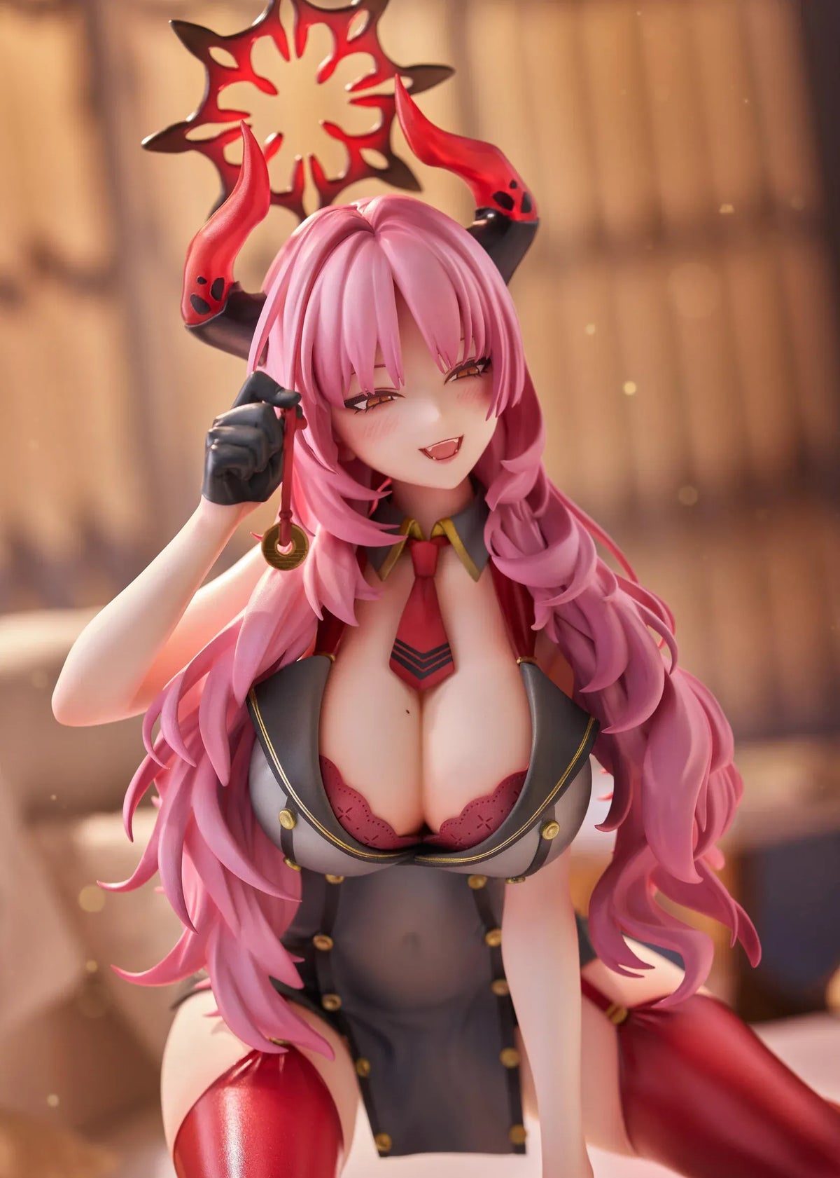 Blue Archive Satsuki Memorial Lobby 1/7 scale figure kneeling in a black-and-red outfit with flowing pink hair, horns, and a dark halo.
