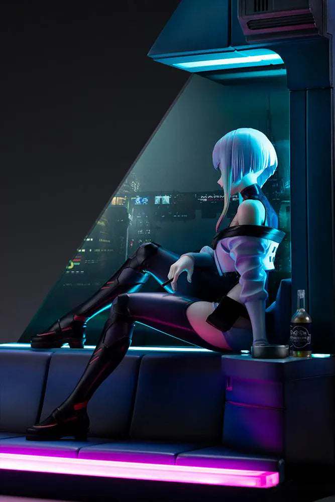 Cyberpunk Edgerunners Lucy 1/7 Scale Figure seated on a cyberpunk diorama base with blue translucent panel and neon details