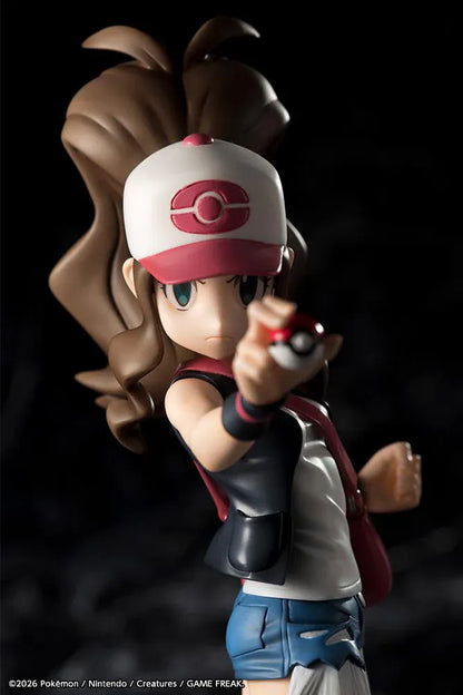Pokemon ArtFX J Hilda with Tepig 1/8 Scale Figure Rerun featuring Hilda in her trainer outfit holding a Poké Ball with Tepig and flame effect on a display base.