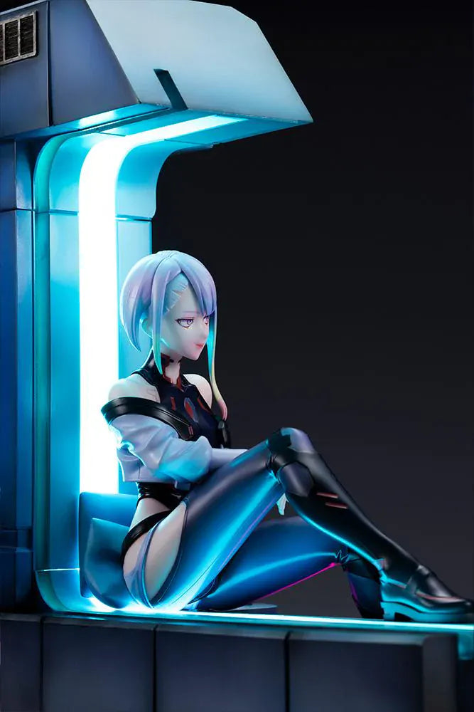 Cyberpunk Edgerunners Lucy 1/7 Scale Figure seated on a cyberpunk diorama base with blue translucent panel and neon details