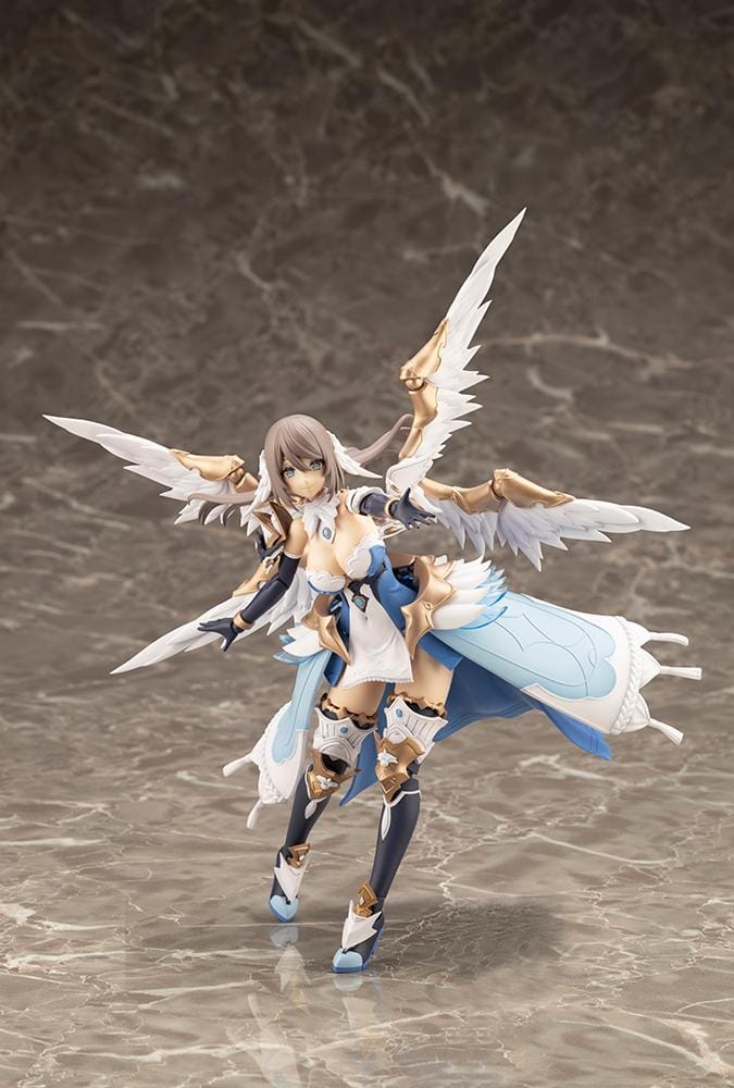 Assembled Arcanadea Ermeda model kit with long brown hair, white feathered wings, a blue and white outfit, gold armor accents, and armored boots.