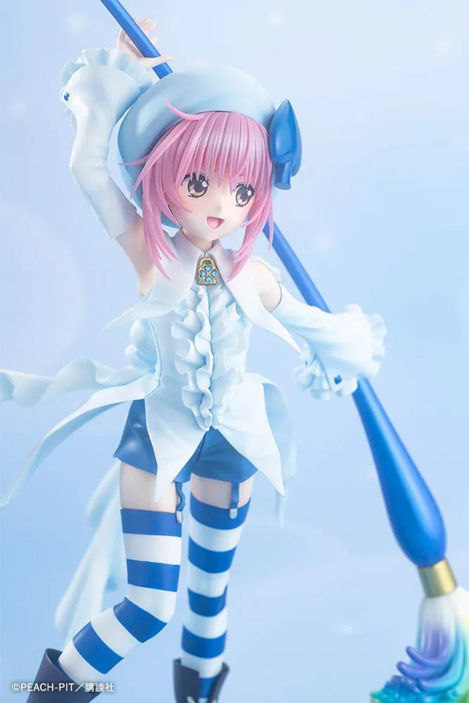 Amulet Spade 1/7 scale figure with pink hair, a white-and-blue costume, striped stockings, and an oversized rainbow-tipped paintbrush.