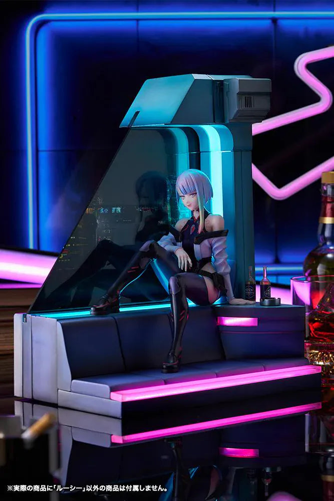 Cyberpunk Edgerunners Lucy 1/7 Scale Figure seated on a cyberpunk diorama base with blue translucent panel and neon details