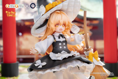 Touhou Project Pocket Fairy Marisa Kirisame figure holding a broom in a black-and-white witch outfit on a yellow star-shaped base.