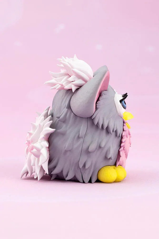 Furby Bishoujo Figure with fashionable character in sunglasses, fuzzy jacket, yellow boots, Furby companion, and glittery display base