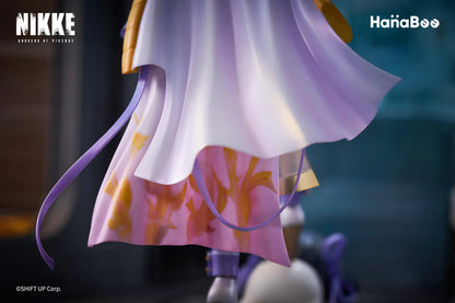Goddess of Victory Nikke Syuen Deluxe Edition 1/6 Scale Figure featuring Syuen in a white-and-purple outfit with ribbon details, themed base, chibi mascot accent, can badge, and acrylic-style bonus artwork.