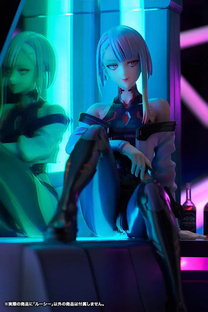 Cyberpunk Edgerunners Lucy 1/7 Scale Figure seated on a cyberpunk diorama base with blue translucent panel and neon details