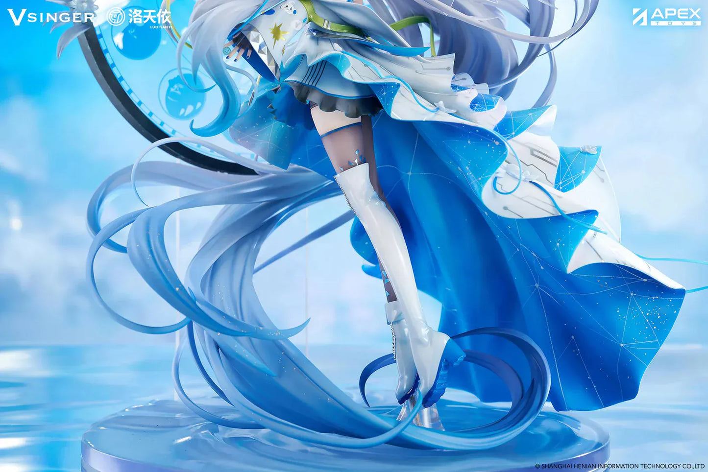 Vsinger Luo Tianyi 12th Anniversary 1/7 scale figure featuring flowing twin tails, layered blue and white dress, and ornate circular backdrop