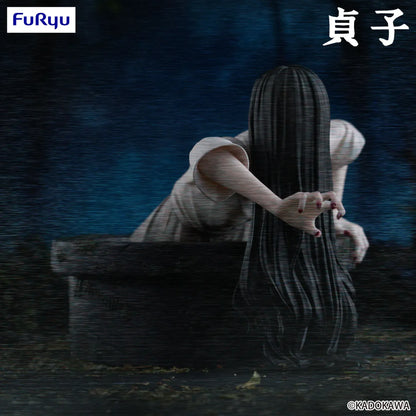 Sadako Noodle Stopper Figure by FuRyu featuring the iconic horror character crawling from a well with long black hair and pale hands.