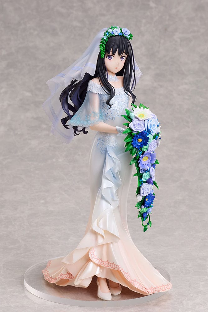 Lycoris Recoil Takina Inoue (Wedding Dress Ver.) 1/7 Scale Figure holding an elegant bouquet of blue and white flowers, wearing a flowing lace and ruffle wedding dress.