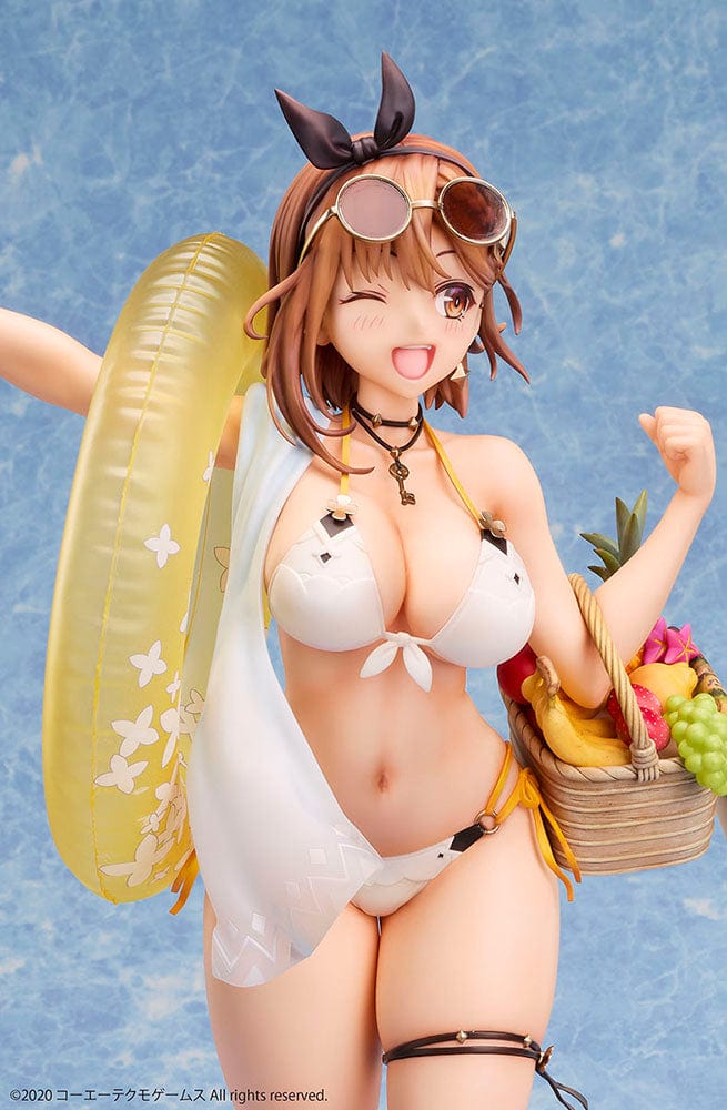 Atelier Ryza 2: Lost Legends & the Secret Fairy Reisalin Stout (Swimsuit Ver.) 1/4 Scale Figure posed on a beach base, wearing a white bikini with an inflatable ring and a basket of tropical fruits.