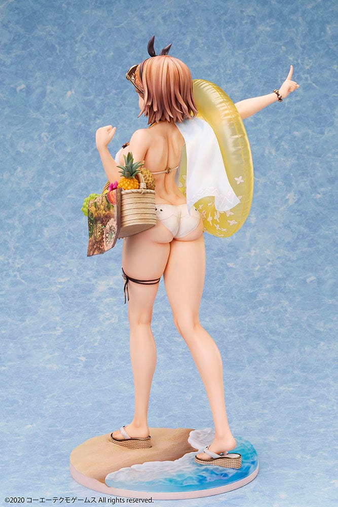 Atelier Ryza 2: Lost Legends & the Secret Fairy Reisalin Stout (Swimsuit Ver.) 1/4 Scale Figure posed on a beach base, wearing a white bikini with an inflatable ring and a basket of tropical fruits.