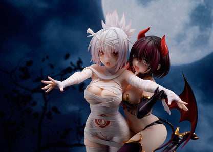 Ayakashi Triangle Matsuri Kazamaki and Suzu Kanade figure with bonus Shirogane, featuring Matsuri in bandages and Suzu in a demon costume with horns and tail.