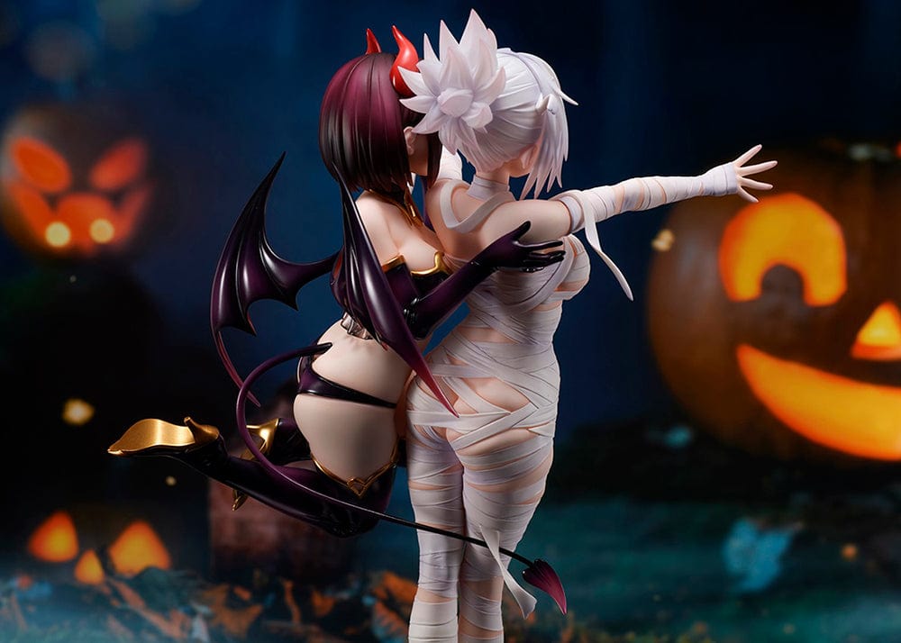 Ayakashi Triangle Matsuri Kazamaki and Suzu Kanade figure with bonus Shirogane, featuring Matsuri in bandages and Suzu in a demon costume with horns and tail.