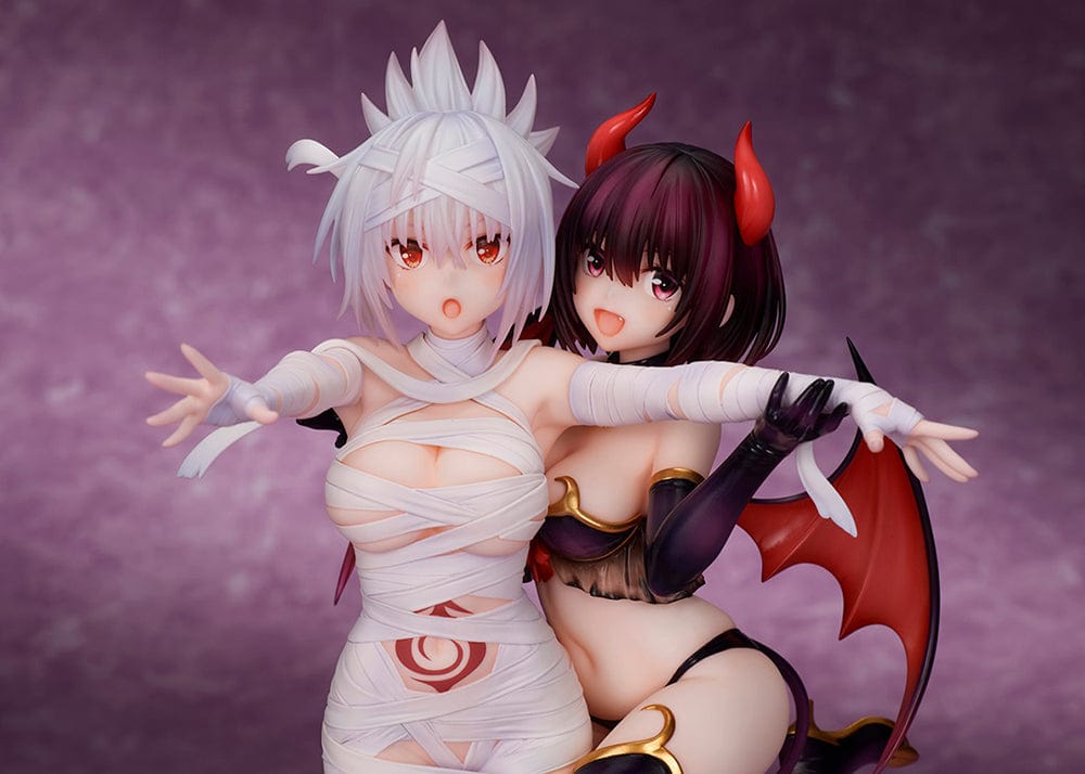 Ayakashi Triangle Matsuri Kazamaki and Suzu Kanade figure with bonus Shirogane, featuring Matsuri in bandages and Suzu in a demon costume with horns and tail.