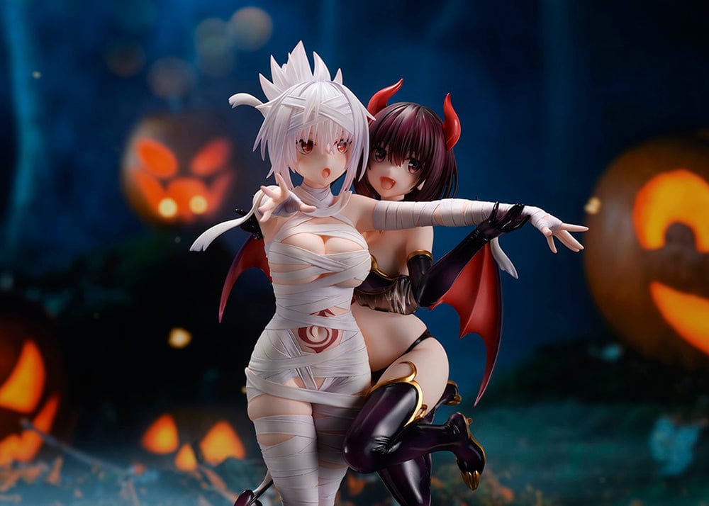 Ayakashi Triangle Matsuri Kazamaki and Suzu Kanade figure with bonus Shirogane, featuring Matsuri in bandages and Suzu in a demon costume with horns and tail.