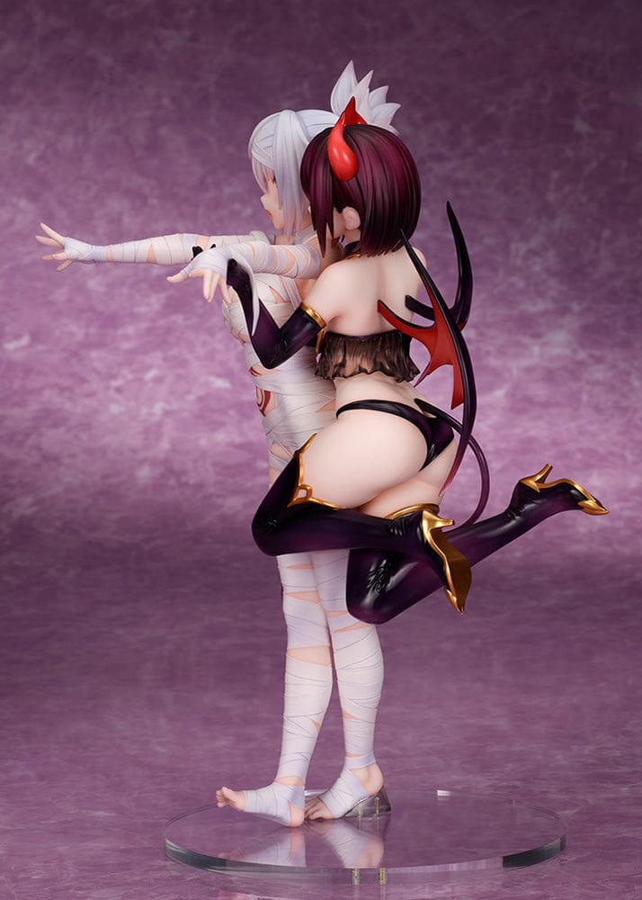 Ayakashi Triangle Matsuri Kazamaki and Suzu Kanade figure with bonus Shirogane, featuring Matsuri in bandages and Suzu in a demon costume with horns and tail.