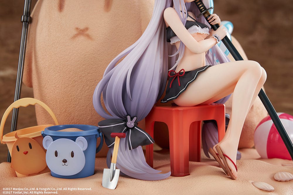 Azur Lane Shimakaze (The Island Wind Rests DX Ver.) 1/7 Scale Figure, lounging under a striped umbrella with a beach ball, bunny ears, and surrounded by sandcastle and character-themed pails, capturing the essence of summer leisure.