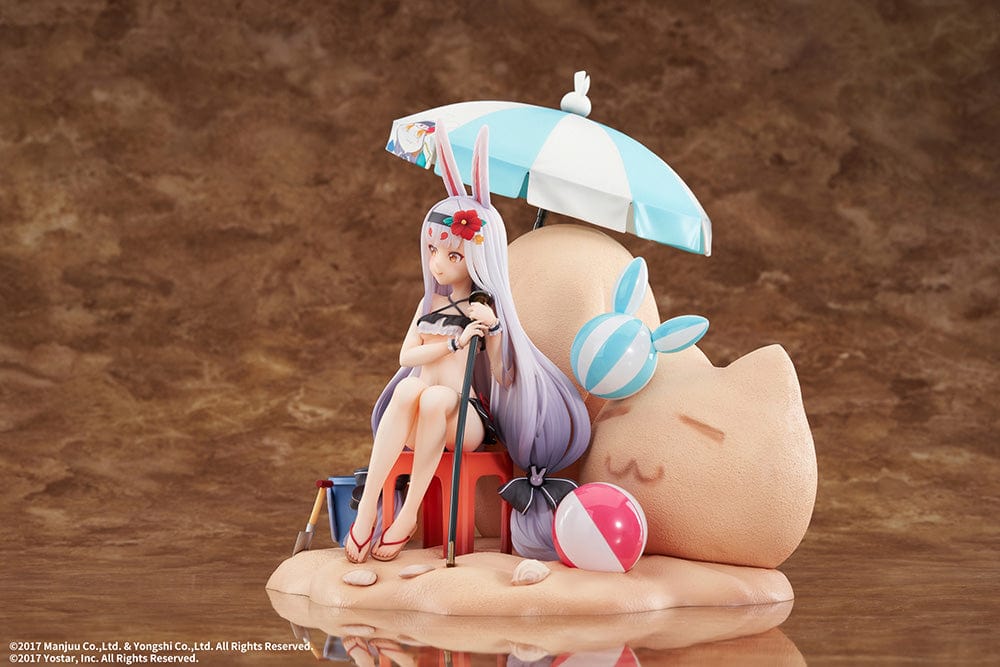 Azur Lane Shimakaze (The Island Wind Rests DX Ver.) 1/7 Scale Figure, lounging under a striped umbrella with a beach ball, bunny ears, and surrounded by sandcastle and character-themed pails, capturing the essence of summer leisure.