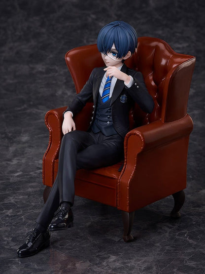 Black Butler: Boarding School Arc Ciel Phantomhive Figure seated in a detailed brown leather armchair, wearing a black suit with blue striped tie and polished shoes.