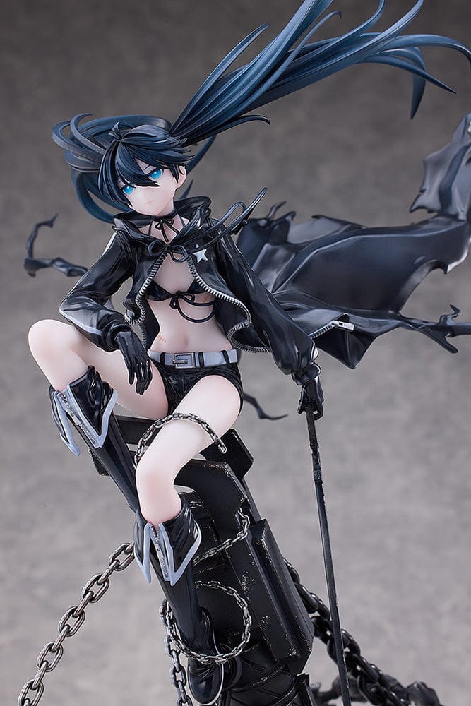 Black Rock Shooter Empress (Pilot Edition Ver.) 1/7 Scale Figure featuring dynamic pose, flowing black coat, blue flame eye, and shattered battlefield base with chains.