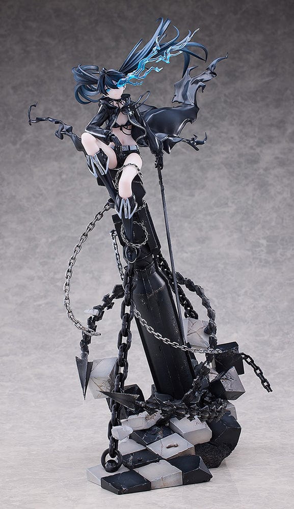 Black Rock Shooter Empress (Pilot Edition Ver.) 1/7 Scale Figure featuring dynamic pose, flowing black coat, blue flame eye, and shattered battlefield base with chains.