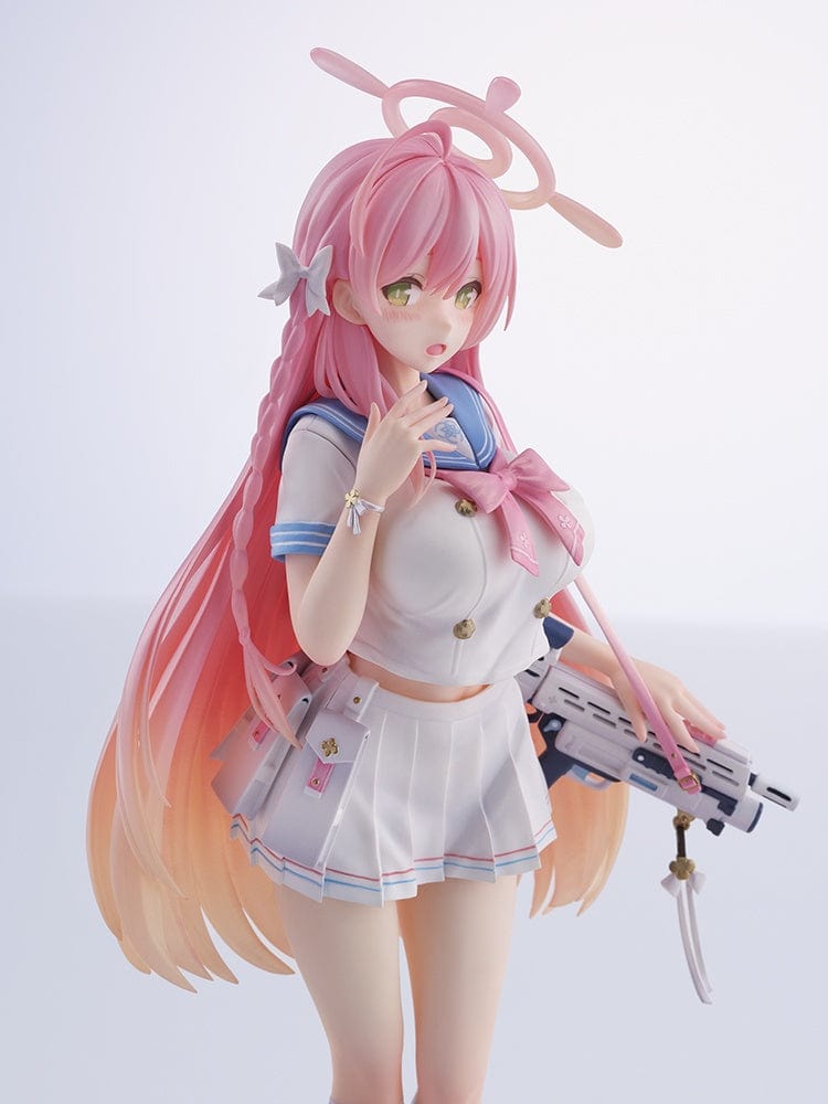 Blue Archive Urawa Hanako 1/7 scale figure shown with two interchangeable outfit options. The first image depicts her in a swimsuit, capturing a carefree summer mood, while the second shows her in a school uniform, highlighting her readiness for strategic gameplay and daily school life, both reflecting her lively persona from the game.