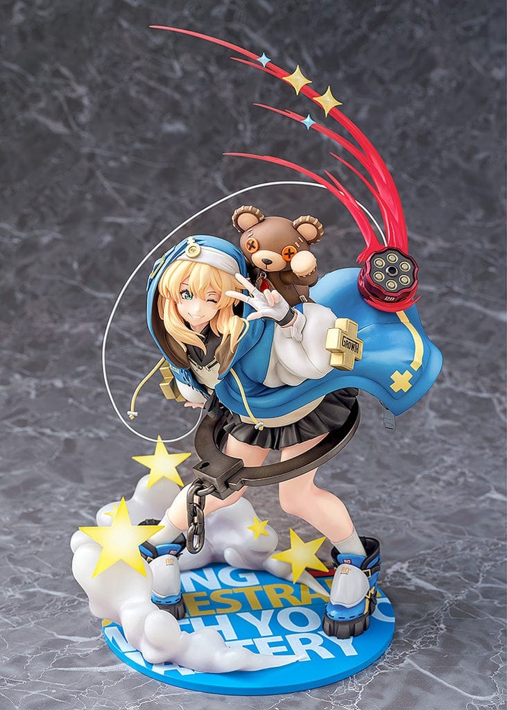 Guilty Gear Strive Bridget 1/6 Scale Figure featuring Bridget in an action pose with her signature blue hoodie and bear companion, surrounded by dynamic effects.