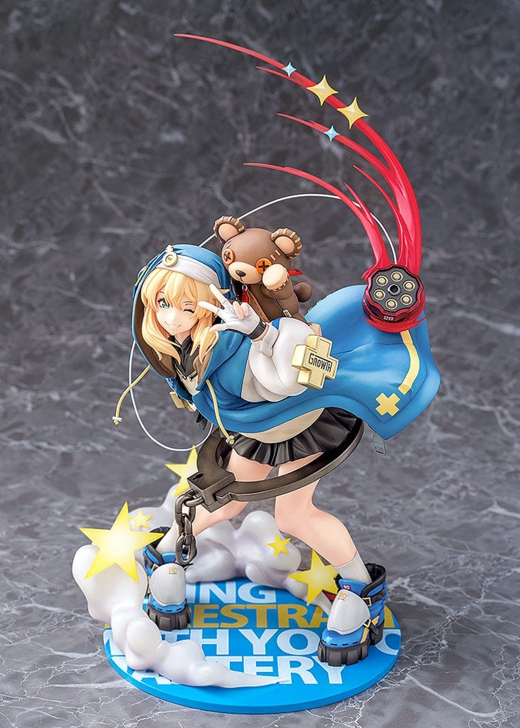 Guilty Gear Strive Bridget 1/6 Scale Figure featuring Bridget in an action pose with her signature blue hoodie and bear companion, surrounded by dynamic effects.