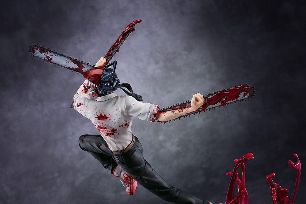 Chainsaw Man 1/7 Scale Figure featuring Denji in mid-leap with chainsaws in hand, surrounded by explosive blood effects on a dynamic base.