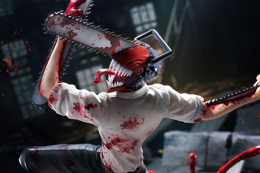 Chainsaw Man 1/7 Scale Figure featuring Denji in mid-leap with chainsaws in hand, surrounded by explosive blood effects on a dynamic base.