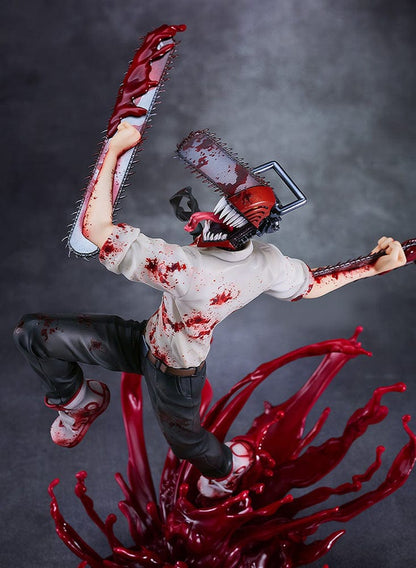 Chainsaw Man 1/7 Scale Figure featuring Denji in mid-leap with chainsaws in hand, surrounded by explosive blood effects on a dynamic base.