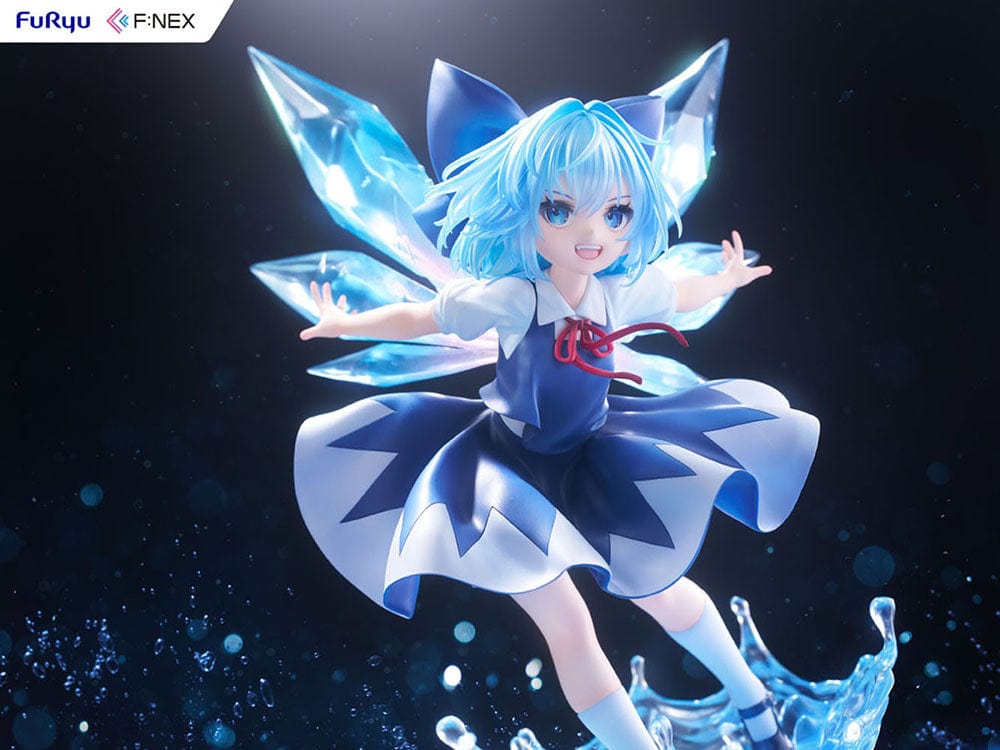 Touhou Project's F:Nex 1/7 scale figure of Cirno, featuring her iconic blue hair and fairy wings, caught in a moment of joyful abandon above a splash of water, in her signature blue and white dress with a red neck ribbon.