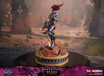 Darksiders III Fury limited edition statue featuring a female warrior in detailed armor, standing with a weapon on a decorative base, with flowing red hair and a fierce expression.