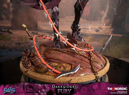 Darksiders III Fury limited edition statue featuring a female warrior in detailed armor, standing with a weapon on a decorative base, with flowing red hair and a fierce expression.