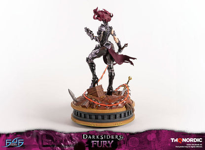 Darksiders III Fury limited edition statue featuring a female warrior in detailed armor, standing with a weapon on a decorative base, with flowing red hair and a fierce expression.