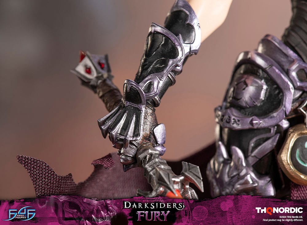 Darksiders III Fury limited edition statue featuring a female warrior in detailed armor, standing with a weapon on a decorative base, with flowing red hair and a fierce expression.