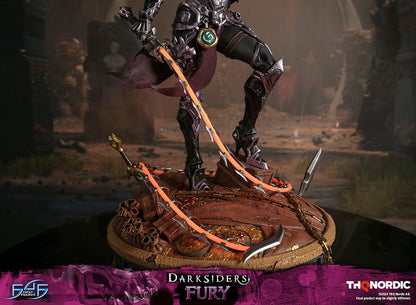 Darksiders III Fury limited edition statue featuring a female warrior in detailed armor, standing with a weapon on a decorative base, with flowing red hair and a fierce expression.