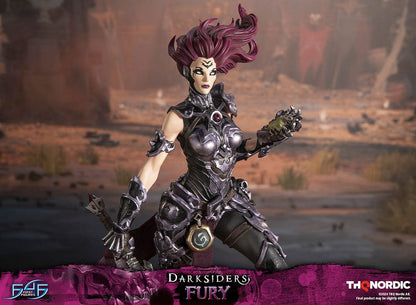 Darksiders III Fury limited edition statue featuring a female warrior in detailed armor, standing with a weapon on a decorative base, with flowing red hair and a fierce expression.