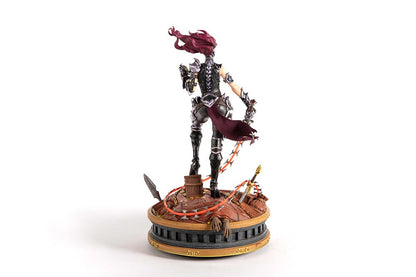 Darksiders III Fury limited edition statue featuring a female warrior in detailed armor, standing with a weapon on a decorative base, with flowing red hair and a fierce expression.