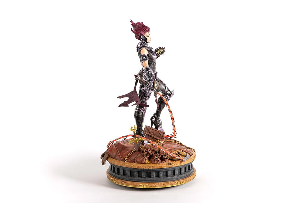 Darksiders III Fury limited edition statue featuring a female warrior in detailed armor, standing with a weapon on a decorative base, with flowing red hair and a fierce expression.