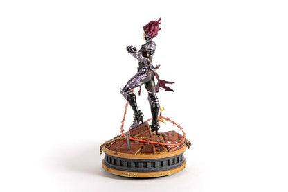 Darksiders III Fury limited edition statue featuring a female warrior in detailed armor, standing with a weapon on a decorative base, with flowing red hair and a fierce expression.