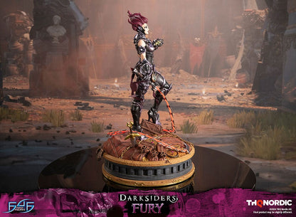 Darksiders III Fury limited edition statue featuring a female warrior in detailed armor, standing with a weapon on a decorative base, with flowing red hair and a fierce expression.