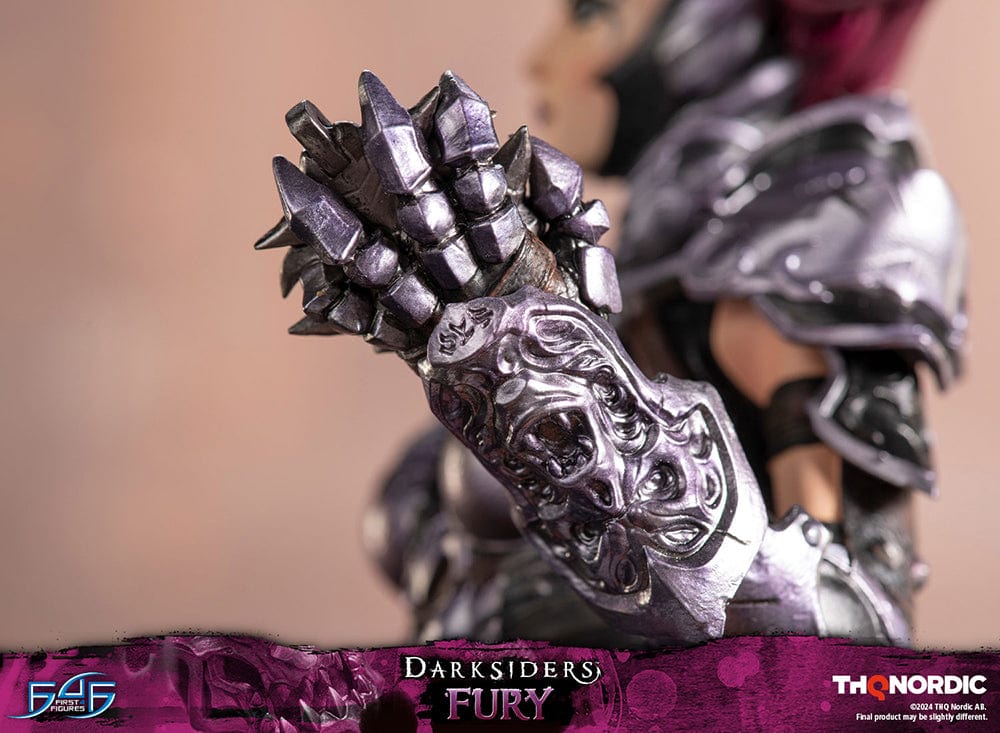 Darksiders III Fury limited edition statue featuring a female warrior in detailed armor, standing with a weapon on a decorative base, with flowing red hair and a fierce expression.