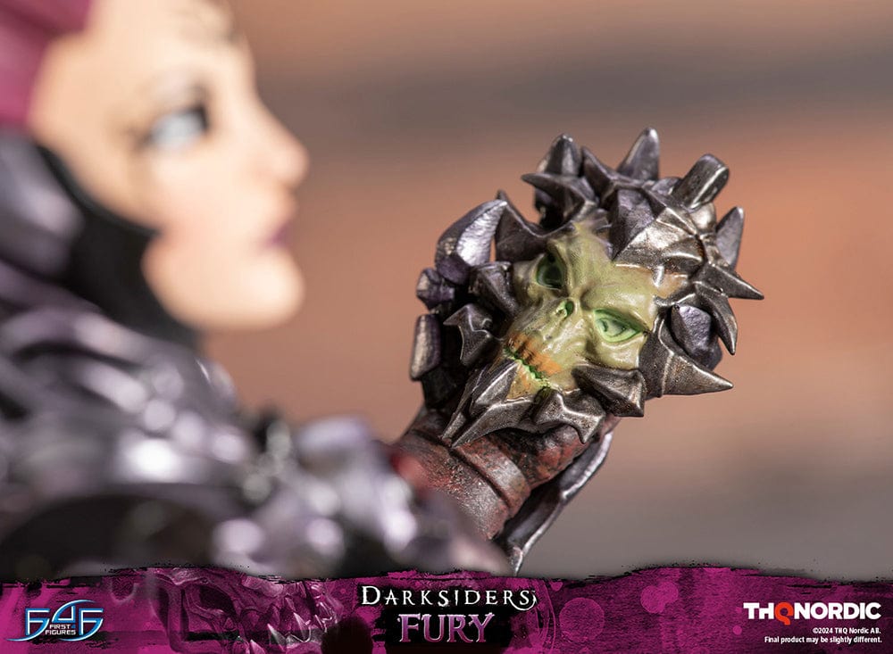 Darksiders III Fury limited edition statue featuring a female warrior in detailed armor, standing with a weapon on a decorative base, with flowing red hair and a fierce expression.