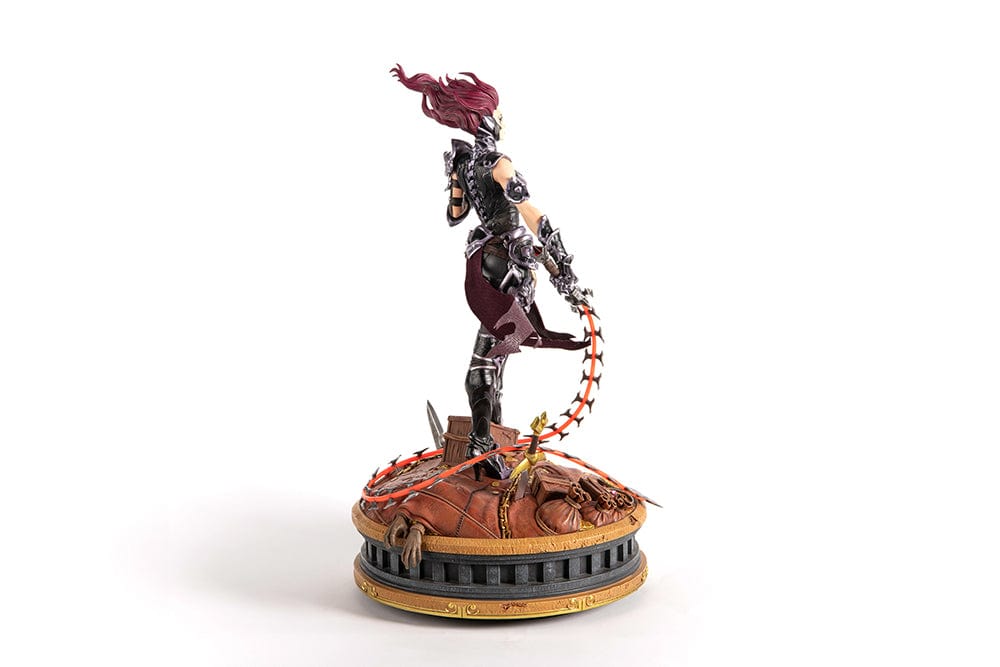 Darksiders III Fury limited edition statue featuring a female warrior in detailed armor, standing with a weapon on a decorative base, with flowing red hair and a fierce expression.