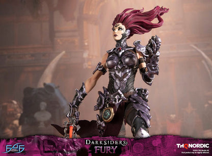 Darksiders III Fury limited edition statue featuring a female warrior in detailed armor, standing with a weapon on a decorative base, with flowing red hair and a fierce expression.