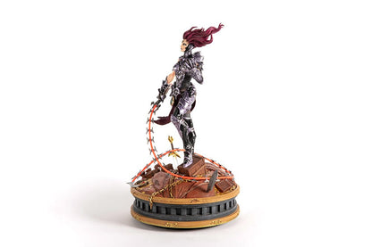 Darksiders III Fury limited edition statue featuring a female warrior in detailed armor, standing with a weapon on a decorative base, with flowing red hair and a fierce expression.