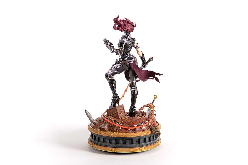 Darksiders III Fury limited edition statue featuring a female warrior in detailed armor, standing with a weapon on a decorative base, with flowing red hair and a fierce expression.