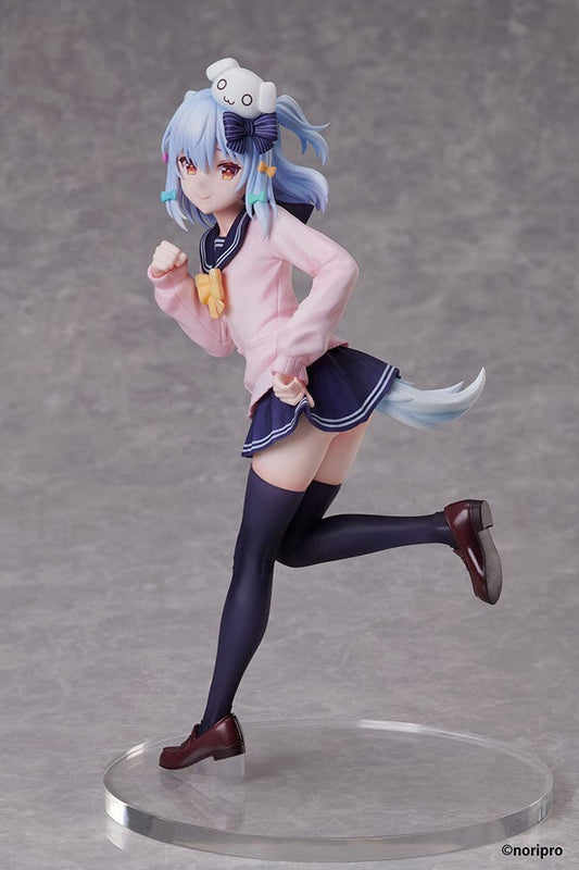 NoriPro Tamaki Inuyama 1/7 scale figure in a playful running pose, wearing a pink school uniform jacket and navy skirt. A white, smiling creature sits on her head, and her blue hair flows dynamically as she moves. The figure stands on a clear circular base.